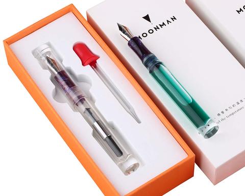 ¡En venta! Moonman-pluma estilográfica C1, gotero completamente transparente, gran capacidad, almacenamiento de tinta, iridio fino, 0,6mm, regalo de moda, nueva ► Foto 1/6