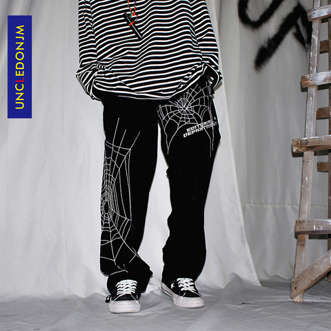 UNCLEDONJM-pantalones bombachos holgados con bordado de araña para hombre, ropa de calle informal de Hip Hop, pantalones de moda para hombre ED933, verano 2022 ► Foto 1/3