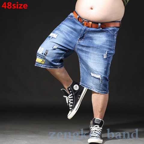 Novedad de verano de talla grande XL de los hombres pantalones cortos de mezclilla viejo agujero suelta tipo grande hombres 6xl 7xl casual para Hombre Pantalones cortos ► Foto 1/6