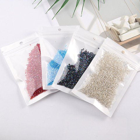 2000 unids/pack de vidrio de 1,5mm Tubo de plata DIY granos de la semilla transparente 15/0 de Bugle Seedbeads para joyería artesanal de accesorios de prendas de vestir ► Foto 1/6