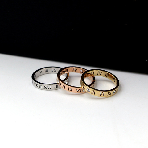 Joyería de moda elegante temperamento de números romanos de la suerte ahuecados anillo de acero de titanio chapado en oro rosa ► Foto 1/6