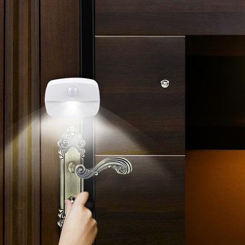2022 nuevo luz LED con Sensor de movimiento lámpara de pared inalámbrica a batería luz de noche sin brillo pasillo armario LED puerta Luz ► Foto 1/6