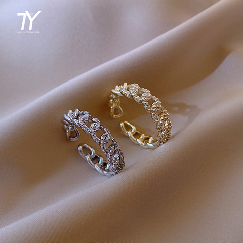Anillo abierto de circón de lujo para mujer, diseño retorcido oro plateado, joyería Coreana de la manera, anillo de dedo inusuales para fiesta de boda, novedad de 2022 ► Foto 1/6