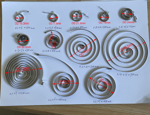 Resorte de bobina de juguete, resorte de bobina de alambre plano en espiral de 0,1-0,2mm de ancho, 3-7mm, muelles de fuerza constante, Estilo Espiral pequeños ► Foto 1/1