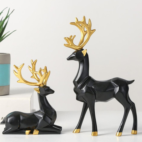 Oro Abstracto estatuas de renos de Navidad figuras nórdicos pequeño resina sentado pie ciervo estatuas de la Oficina para el hogar Decoración ► Foto 1/4