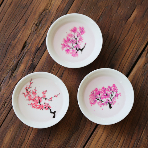 Taza de Sakura mágica japonesa, taza de Sake que cambia de Color con la temperatura fría, taza de té de cerámica Kung fu, tazón de té ► Foto 1/6