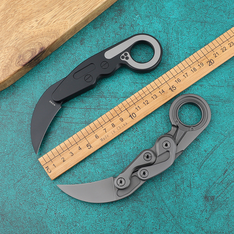 Cuchillo de titanio con mango mecánico, herramienta plegable de supervivencia al aire libre, afilada EDC, Karambit CS GO, hoja fija M390 ► Foto 1/6