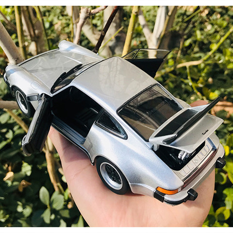 Welly-Coche de juguete de aleación de metal fundido a presión para niños, modelo 1:24 1974 Porsche 911 Turbo3.0, regalo de cumpleaños y Navidad ► Foto 1/6