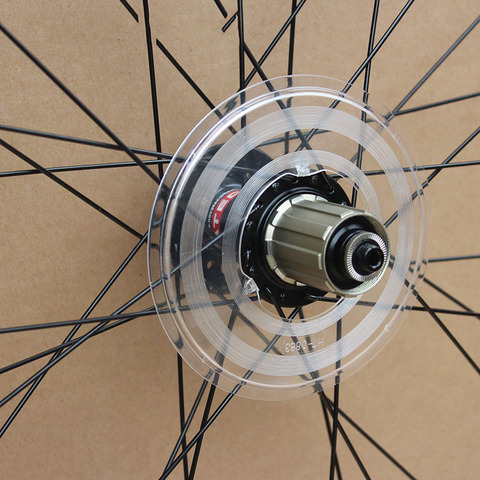 1 unid plástico MTB Mountain Bike Road bicicleta volante soporte freno de disco Hubs de Cassette cubierta de protección Accesorios ► Foto 1/6