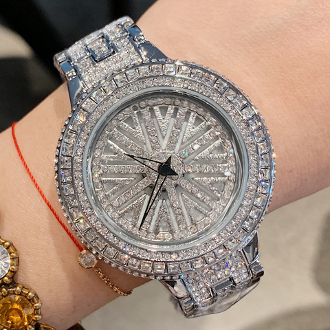 Reloj de cuarzo con esfera giratoria para mujer, pulsera de diseño de alta calidad, resistente al agua, con diamantes de imitación de cristal ► Foto 1/5