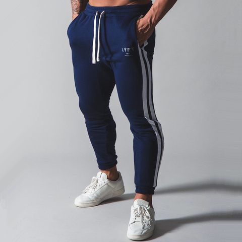 Pantalón de algodón pantalones casuales de los hombres Skinny Sweatpants otoño corriendo Pantalones Hombre Pantalones de gimnasio Fitness entrenamientos deportivos Mujer ► Foto 1/6