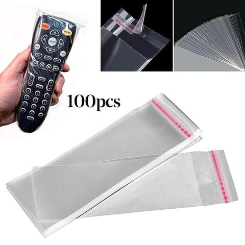 Cubierta protectora de Control remoto para TV, bolsa transparente de plástico autoadhesiva para Control remoto de aire acondicionado, hogar, Hotel, 100 Uds. ► Foto 1/6