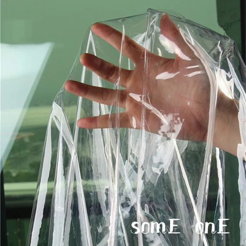 0,2mm transparente tela TPU PVC película de plástico impermeable DIY impermeable abrigo de cristal bolsas etapa de decoración de diseñador de ropa de tela ► Foto 1/5