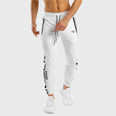 Pantalones deportivos con bolsillos y cremallera para hombre, ropa deportiva de algodón adelgazante para entrenamiento, para otoño e invierno, talla grande ► Foto 1/6