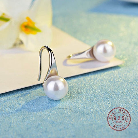 Pendientes de perla blanca redonda para mujer, aretes de color plateado Simple, grande y transparente, joyería clásica, regalos de Año Nuevo ► Foto 1/6