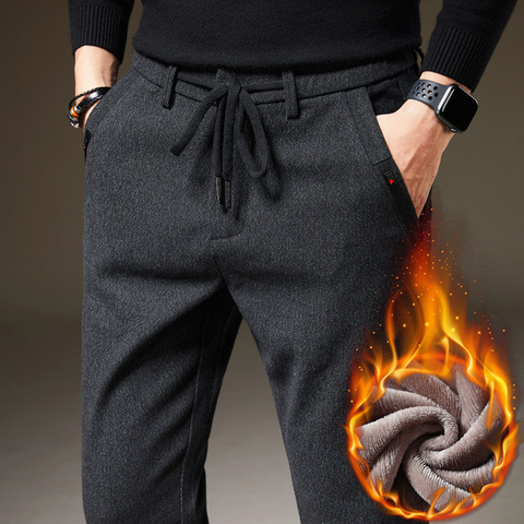 Pantalones informales cálidos para hombre, pantalones de oficina ajustados de marca de lana gruesa de tela cepillada a la moda, color negro marino, para invierno, novedad de 2022 ► Foto 1/6