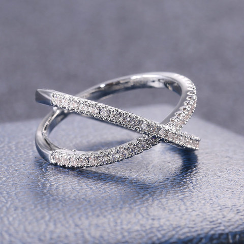 Huitan de lujo Cruz forma X las mujeres anillo de compromiso la pavimentada CZ piedra Color plata Simple elegante mujer anillo de joyería de gran oferta ► Foto 1/6