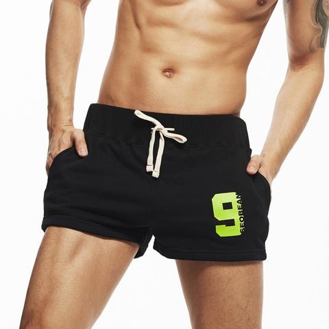 SEOBEAN-pantalones cortos informales de algodón para hombre, pantalones cortos caseros holgados con bolsillos para fitness, para playa y verano ► Foto 1/4