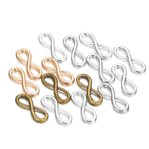 30 Uds. De dijes de bronce tibetano de 8x23mm, conectores con forma de símbolo infinito para colgantes, joyería artesanal, suministros de accesorios ► Foto 1/6