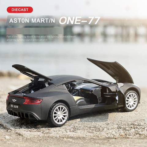 Aston Martin One-77 coches de juguete de Metal, modelo a escala de Diecast 1/32, niños presentes con función de tracción trasera/música/luz/puerta de apertura ► Foto 1/6