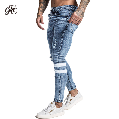 Pantalones vaqueros ajustados de Gingtto para hombre Pantalones vaqueros rasgados grandes y altos elásticos azules para hombre cintura elástica desgastada 32 la pierna 30 zm49 ► Foto 1/6