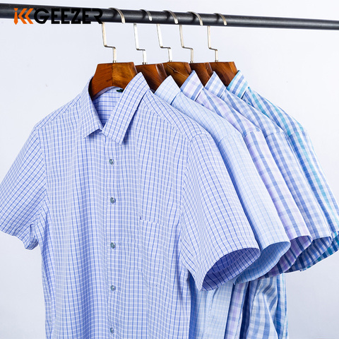 Vestido de verano de manga corta a cuadros para hombre, camisa Formal a rayas, corte entallado, informal, bolsillo, negocios, 2022 ► Foto 1/6