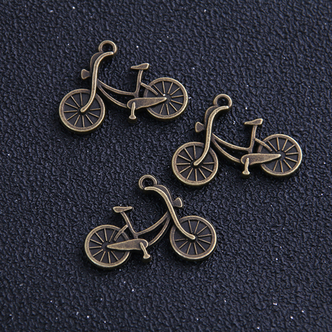 Lote de 10 unidades de Mini colgantes de Metal de aleación de bronce Vintage para bicicleta, joyería de 19x26mm, venta al por mayor ► Foto 1/2