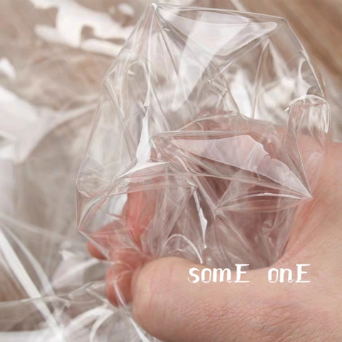 Transparente tela TPU PVC película de plástico impermeable DIY impermeable abrigo de bolsas de fondo decoración de diseñador de ropa de tela ► Foto 1/4