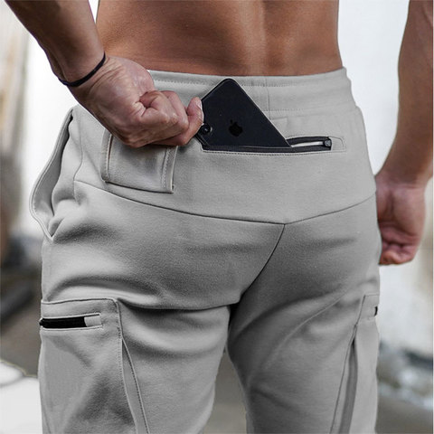 Pantalones de chándal con diseño de bolsillo para hombre, pantalón de chándal de camuflaje de algodón, para fitness multibolsillo, traje de entrenamiento de moda ► Foto 1/6