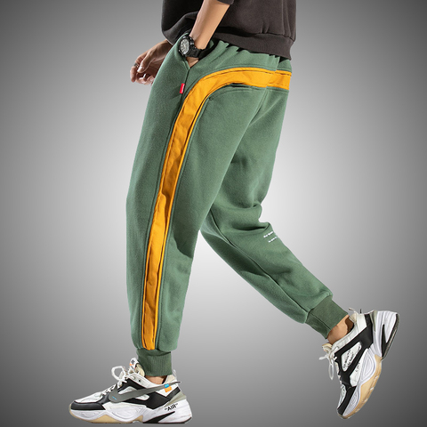 Lado pantalones de rayas de los hombres 2022 nueva marca pantalones ropa de calle de moda para hombre Pantalones de Hip Hop hombre sueltos Fit pantalones Harem ► Foto 1/6