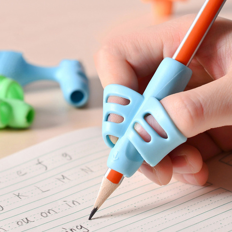 Soporte para lápiz de la PC para niños principiantes, herramienta de corrección de postura de silicona para aprendizaje, suministros para estudiantes, 2 uds., 5 uds. ► Foto 1/6