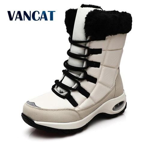 Botas de invierno impermeables de alta calidad para mujer, botas de nieve cálidas de felpa para mujer, zapatillas antideslizantes para exteriores, botines con plataforma de piel ► Foto 1/6