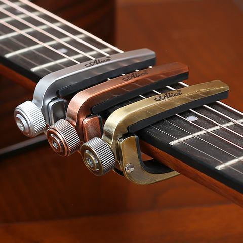 Capos de guitarra eléctrica cejilla guitarra acústica bajo violín ukelele Capotraste solo melodía abrazadera de gatillo-3 colores de Metal Capo ► Foto 1/6