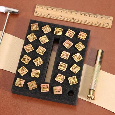 26 piezas alfabeto de cuero estampado de herramientas de perforación 26 inglés letras sello Metal conjunto de herramientas de cuero cartera ► Foto 1/6