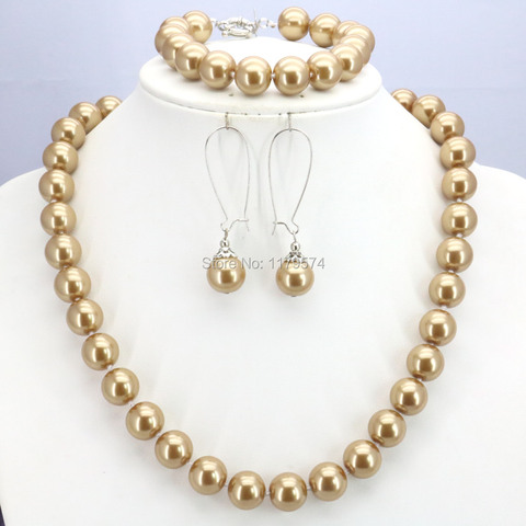 Collar de perlas de concha redonda para mujer y niña, juego de pendientes, diseño de joyería, regalo de Navidad Popular, 12mm, Color dorado ► Foto 1/6