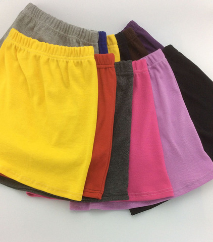 Primavera y verano colores de caramelo Mini faldas niñas niña paquete de la cadera falda niños faldas para niñas ► Foto 1/6
