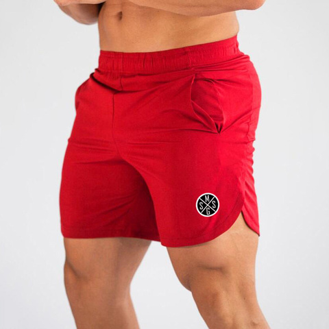 Muscleguys pantalones cortos de tabla para hombres Sexy playa Bermuda Wear Sea Short hombres Gyms Shorts de secado rápido Joggers pantalones de chándal pantalones cortos de Fitness ► Foto 1/6