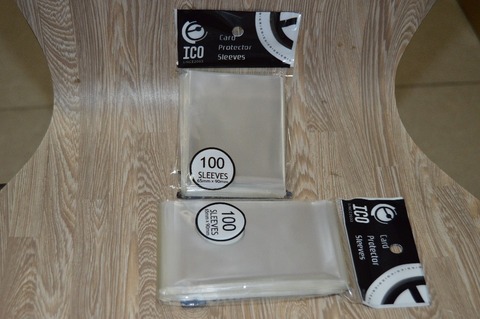 100 unids 65*90mm Protectores de Cartas Tarjetas Protector de Barrie mágica herramienta de la tarjeta de juego de mesa de negociación mangas ► Foto 1/1