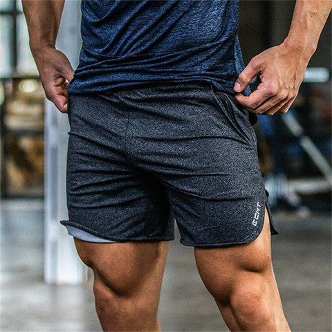 Novedad de verano, pantalones cortos de Fitness para hombre, pantalones cortos de moda informales para gimnasio, entrenamiento de culturismo, pantalones cortos hasta la pantorrilla, pantalones deportivos de marca ► Foto 1/6