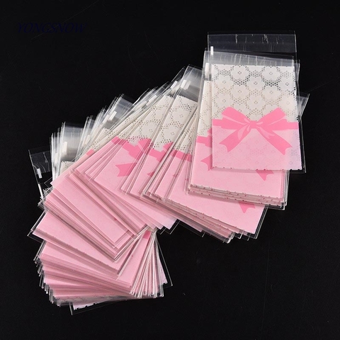 50 Uds. 7*10 cm/7*7 cm lindo diseño de lazo rosa paquetes de pastel de regalo OPP bolsas de plástico dulces galletitas y bizcochos bolsas suministros de fiesta de boda ► Foto 1/6