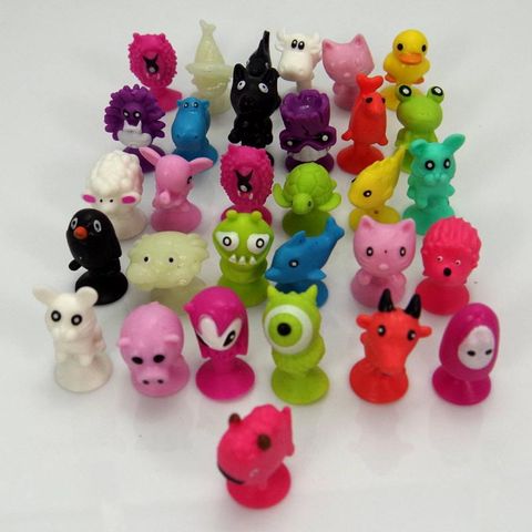 50 unids/bolsa buena pluma niños de dibujos animados figuras de acción Animal juguetes tonto Mini copa de succión de cápsula modelo ► Foto 1/5