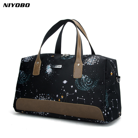 NIYOBO-Bolso de viaje informal para mujer, bolsa de viaje Oxford impermeable, portátil, con estampado de estrellas, de fin de semana, de gran capacidad ► Foto 1/6