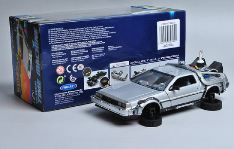 Welly 1:24 máquina del tiempo Delorean volver al futuro parte 2 Modo de mosca modelo de coche nuevo en caja ► Foto 1/4