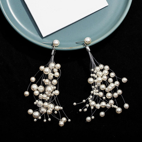 Pendientes Punk para mujer, nuevos pendientes a la moda, temperamento elegante, personalidad Simple, completamente de estrellas, borla larga, perla, línea de pescado, 2022 ► Foto 1/5