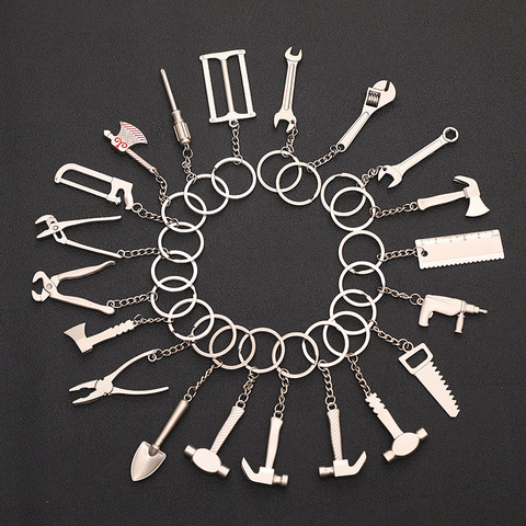 Llaveros de bolsillo para hombre, Herramienta de combinación de llavero portátil, Mini utilidad, regla, llave de martillo, alicates, pala ► Foto 1/4