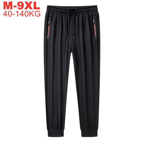 Pantalones grandes informales para hombre, pantalones de chándal de alta calidad, transpirables, elásticos, de talla grande 5XL, 9x140kg, color negro, para verano ► Foto 1/6