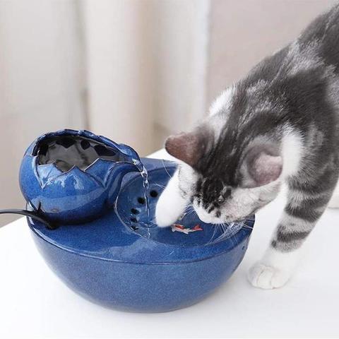 Bebedero eléctrico de cerámica para gatos y perros, tazón para beber, fuente de agua automática para gato, dispensador de productos para mascotas, tazón de comida ► Foto 1/6