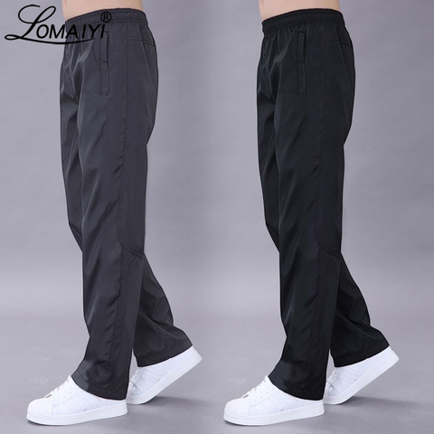 Pantalones informales lovaiyi de talla grande 6XL para hombre, pantalones de Primavera/otoño para hombre, pantalones transpirables de secado rápido, pantalones negros sueltos para hombre AM411 ► Foto 1/6