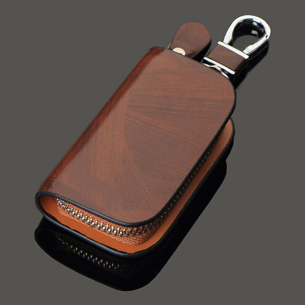 Funda inteligente para llave de coche carcasa de cuero a distancia, antiarañazos, bolsa de 9,5x5,5x2,5 cm, Protector de llaves negro/marrón ► Foto 1/6