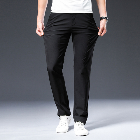 Pantalones rectos elásticos de LICRA para hombre, ropa clásica sin planchar, color negro y Beige, moda de verano, 2022 ► Foto 1/5